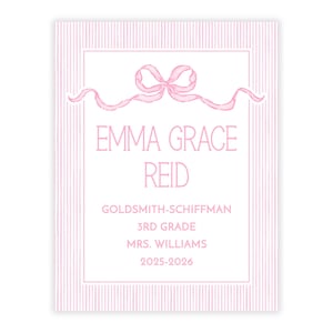 May include: A pink and white striped card with a pink bow illustration at the top. The card features the name "EMMA GRACE REID" in pink, along with additional text: "GOLDSMITH-SCHIFFMAN", "3RD GRADE", "MRS. WILLIAMS", and "2025-2026".