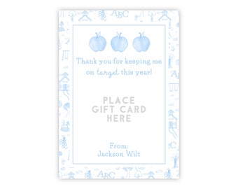 May include: A blue and white teacher appreciation gift card holder with a schoolhouse and apple theme. The text reads "Thank you for keeping me on target this year!" and "Place Gift Card Here". The card is from Jackson Wilt.