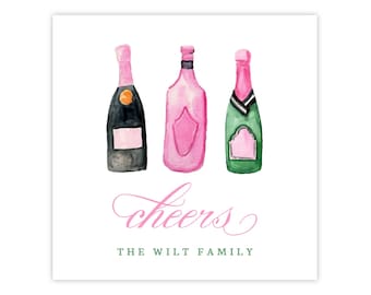 May include: Three watercolor illustrations of champagne bottles in pink, green, and black with the text "cheers" and "The Wilt Family" in pink.