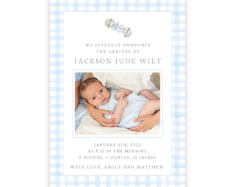 May include: A blue and white gingham baby announcement card with a photo of a baby boy. The card includes the text "We joyfully announce the arrival of Jackson Jude Wilt" and "January 9th, 2023 at 8:21 in the morning, 6 pounds, 11 ounces, 21 inches. With love, Emily and Matthew."