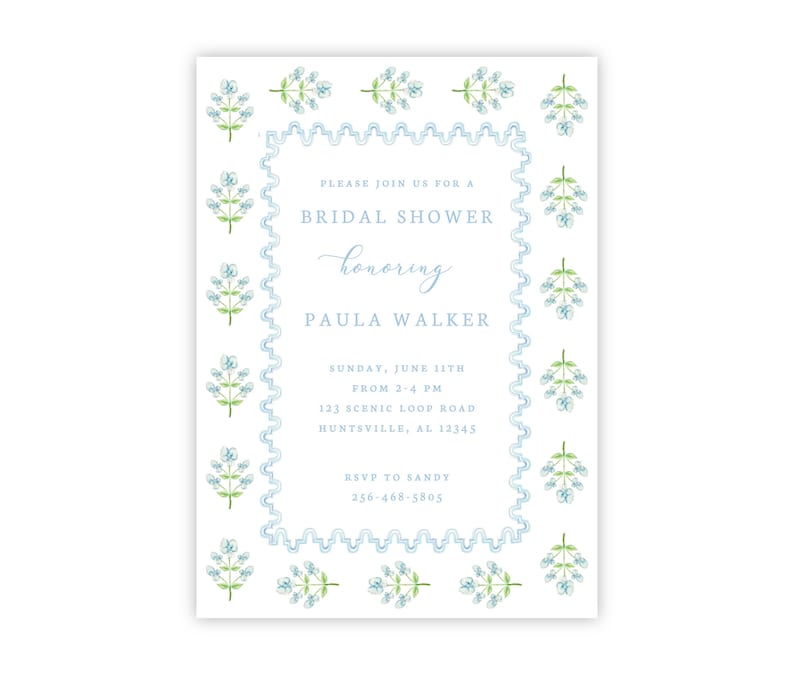 May include: A blue and white floral border surrounds a white invitation card with text that reads "Please join us for a Bridal Shower honoring Paula Walker. Sunday, June 11th from 2-4 PM. 123 Scenic Loop Road, Huntsville, AL 12345. RSVP to Sandy 256-468-5805."