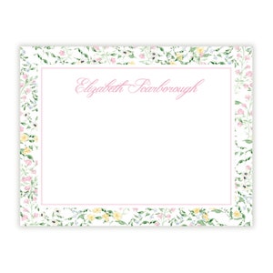 May include: A white card with a pink floral border and the name "Elizabeth Scarborough" printed in pink cursive.