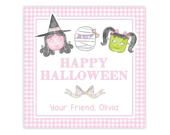 May include: A square tag with a pink and white gingham border featuring illustrations of a witch, a mummy, and a green monster. The text reads HAPPY HALLOWEEN and Your Friend, Olivia, with a decorative bow graphic centered below the text.
