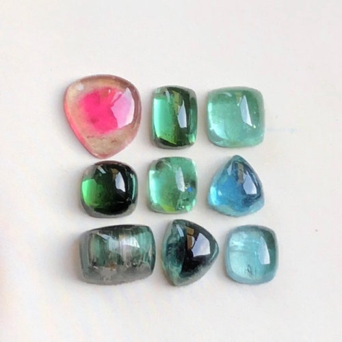 14.6 carats lovely tourmaline cabochon___ Sizes~~ 6.4mm to store 9.6mm