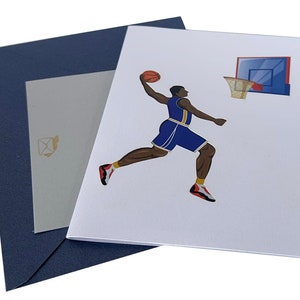 Basketball pop up card comes with embossed message note and envelope.