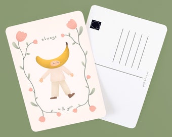 Toujours avec vous / Carte postale A6 illustrée d'une tête de banane entourée de fleurs souriantes - Impression confortable