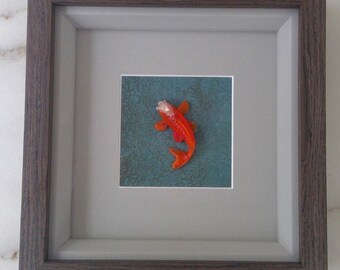 Koi Carp picture. Resin Koi carp on a ceramic base.