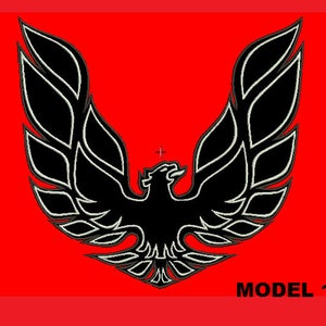 May include: A black and white stylized eagle emblem with outstretched wings, set against a vibrant red background. The design features intricate detailing and the text "MODEL 1" in the lower right corner.