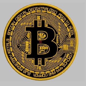 May include: A gold-colored Bitcoin coin with the text "Bitcoin Digital Decentralized Peer to Peer" around the edge and "25 Fine Copper 1oz 999.9  Pure Metals" on the bottom.