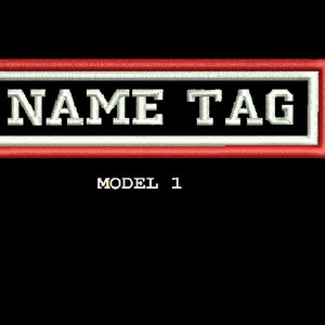May include: Red and white embroidered patch with the text "NAME TAG" in white on a black background. The text "MODEL 1" is below the patch.