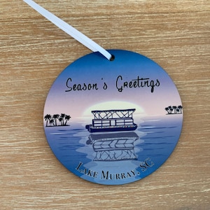 Pontoon Christmas ornament with option to personalize with your favorite boating paradise location.