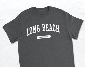 May include: A dark grey t-shirt with white text that reads "LONG BEACH CALIFORNIA".