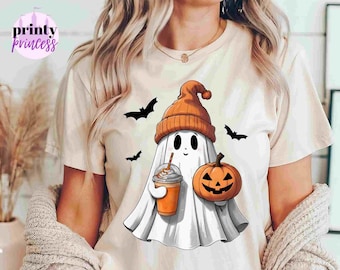 May include: A white ghost wearing an orange beanie hat holds a pumpkin and a pumpkin spice latte.  Bats fly in the background.