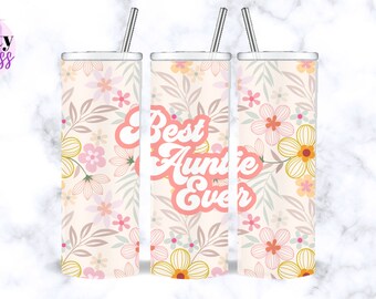 May include: Three stainless steel tumblers with a floral pattern and the text "Best Auntie Ever" in pink. The tumblers are on a white marble background.