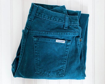 teal color jeans