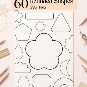 May include: A white sheet with black outlines of various rounded shapes, including a cloud, a crescent moon, and a flower. The text "60 Rounded Shapes SVG | PNG" is at the top. Pencils and a ruler are in the background.