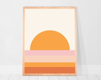 Könnte beinhalten: Ein gerahmter Druck mit einem minimalistischen geometrischen Design, das einen großen orangefarbenen Halbkreis über einer Reihe horizontaler Streifen in Rosa, Pfirsich und Orange zeigt.