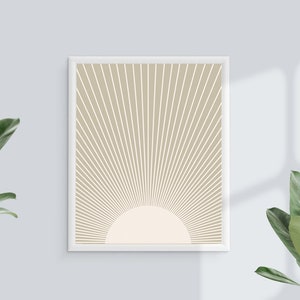Puede incluir: Una impresi&oacute;n enmarcada con un fondo beige y l&iacute;neas blancas que irradian desde el centro, formando un patr&oacute;n de rayos de sol. El centro del patr&oacute;n de rayos de sol es un c&iacute;rculo blanco.