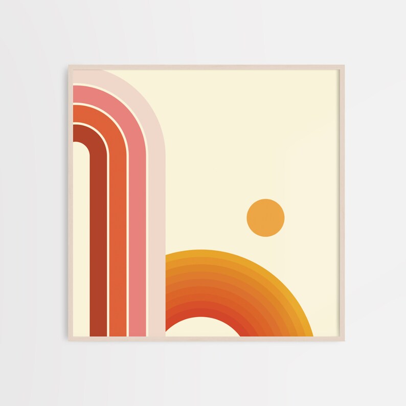 May include: Abstract geometric art print with a retro 70s style. The print features a series of curved lines in shades of orange, pink, and red, with a smaller circle in orange in the upper right corner.