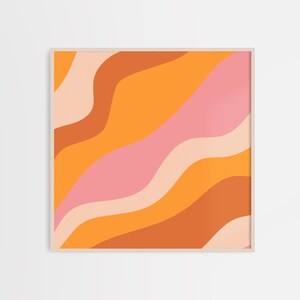 May include: Abstract art print with a framed design featuring wavy lines in shades of orange, peach, and pink.