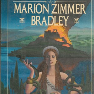 May include: Book cover featuring a woman with long red hair holding a green snake. The background is a dark blue sky with a burning castle in the distance. The title of the book is "Firebrand" by Marion Zimmer Bradley, author of "The Mists of Avalon".