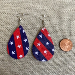 Faux leather earrings, teardrop earrings, teardrop shape, floral, flowers, fashionista, fashion, dangly, patriotic, shiny, sparkly