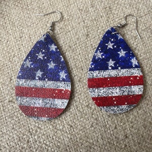 Faux leather earrings, teardrop earrings, teardrop shape, floral, flowers, fashionista, fashion, dangly, patriotic, shiny, sparkly