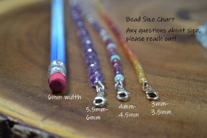 May include: A close-up of a wooden surface with a blue pencil and three beaded bracelets. The pencil's eraser is 6mm wide. The bracelets have various bead sizes, ranging from 3mm to 6mm. Text on the image reads "Bead Size Chart."