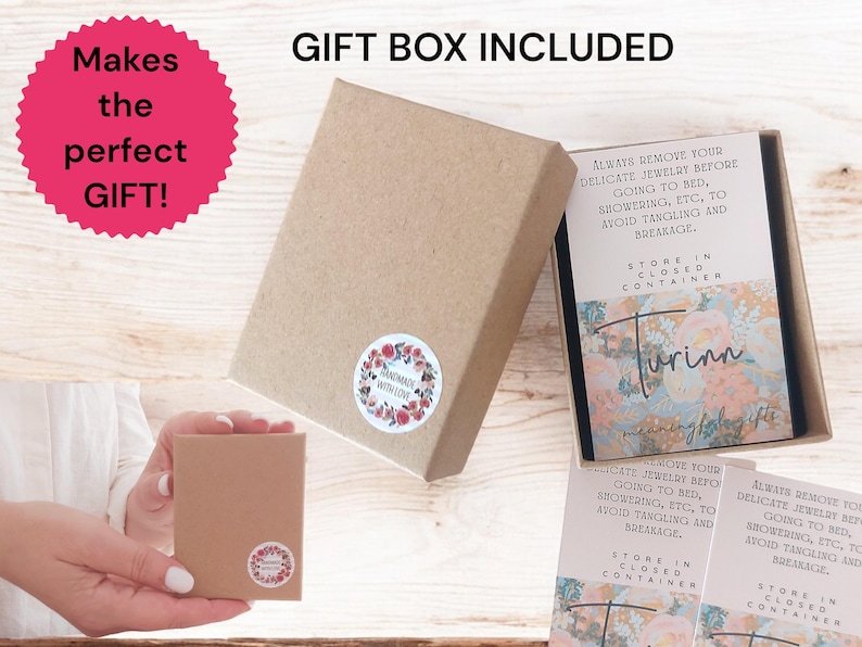 May include: A square brown cardboard gift box with a floral sticker reading Handmade With Love. Inside, a card features the text Turinn meaningful gifts and instructions to remove delicate jewelry before bed or showering and store in a closed container.