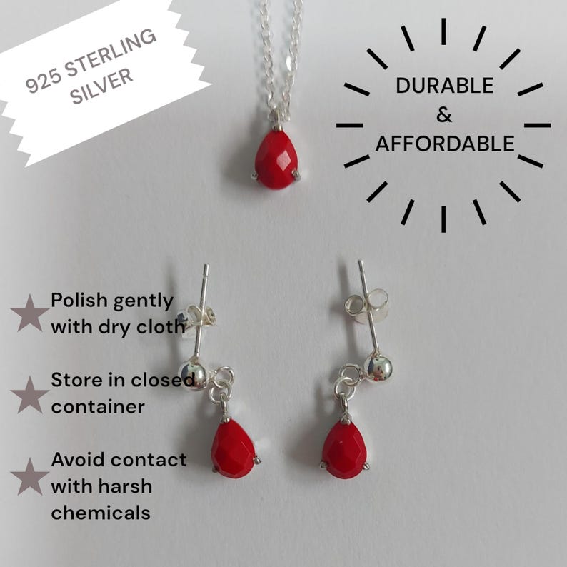 May include: A 925 sterling silver necklace and earring set featuring faceted red teardrop pendants. The image includes text stating 925 STERLING SILVER, DURABLE & AFFORDABLE, and care instructions: Polish gently with dry cloth, Store in closed container, Avoid contact with harsh chemicals.