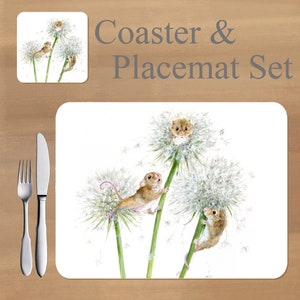May include: Coaster and placemat set with a watercolour illustration of mice on dandelions. The set includes a square coaster and a rectangular placemat. Silverware is on the left side of the placemat.