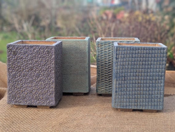 Small stoneware garden pots, suitable for all weathers