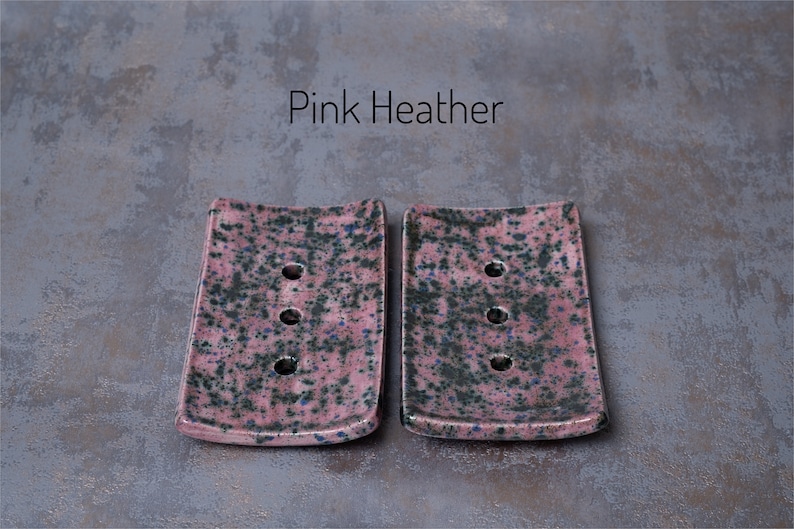 Pink Heather is a muted pink with black and blue speckles, varying in intensity.