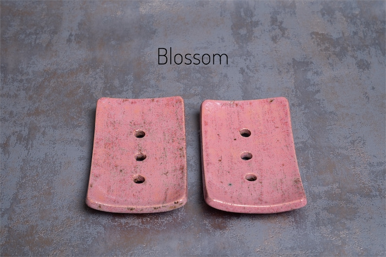 Blossom is a pink with various markings of brown and pale peach.