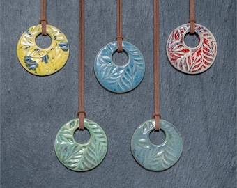 Ceramic Pendant, stylish and bold, with subtle embossing.