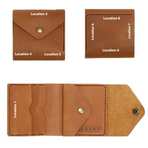 May include: A brown leather wallet with multiple card slots, a billfold, and a flap pocket. The wallet has the word "LUCKY" embossed on the front.