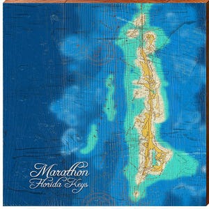 May include: A wooden wall art piece featuring a map of Marathon, Florida Keys. The map is in shades of blue, teal, and yellow, with the text "Marathon Florida Keys" in a decorative font. The wood has a visible grain.