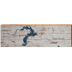 May include: A rectangular wooden sign with a distressed white finish, featuring a blue map of Pend Oreille Lake. The lake's outline is prominently displayed, with the name "Pend Oreille" written in a cursive font.