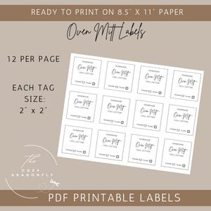 Op de afbeelding: Printbare PDF-labels voor ovenwanten, met de tekst "Oven Mitt Labels". Elk label is 5,08 cm x 5,08 cm groot en er staat "HANDMADE 100% COTTON" op. De pagina is ontworpen om te printen op A4-papier.