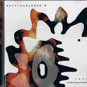 May include: A CD cover with a black and white abstract design on a white background. The design features a large, irregular shape with a smaller circle inside. The text "RA7h15m9sD805*8'" is at the top of the cover. The text "rane camelopardalis" is at the bottom of the cover.