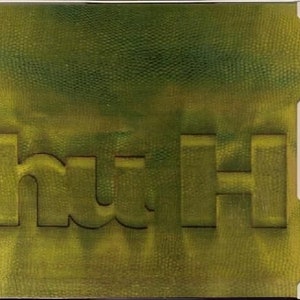 May include: A green textured background with the word "huh" in white letters.