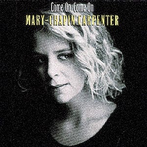 May include: Black and white photograph of Mary Chapin Carpenter, a singer-songwriter, on the cover of her album "Come On Come On".