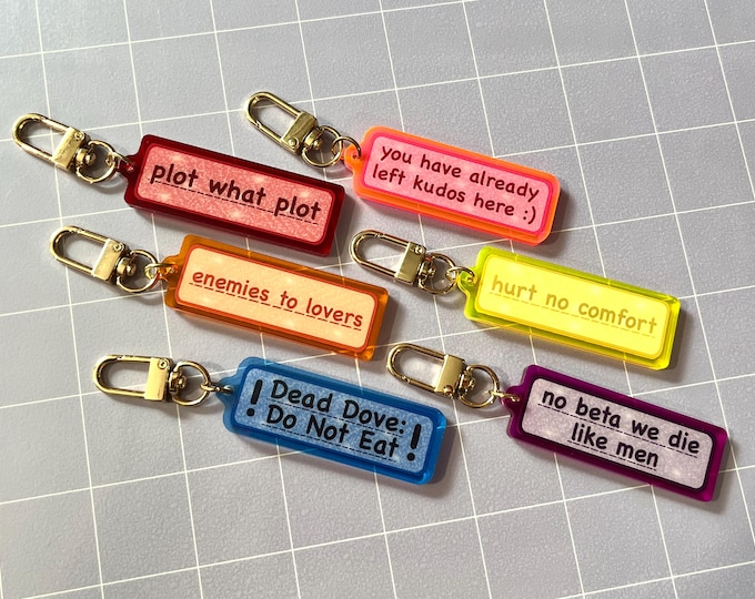 Kudos and Dead Dove 2.5" Pink and Blue Acrylic Charm Keychains (Choose One)