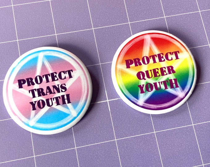 DONATION DESIGN - Nicole Brennan Draws x AstralxWitch - Protect Queer/Trans Youth 2.25" Pinback Button