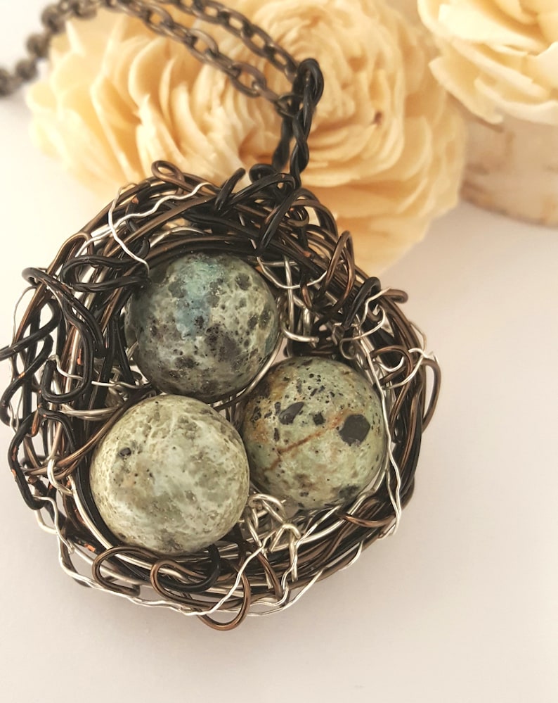Handcrafted Birds Nest Necklace Large Birdsnest with natural soft blues of egg stones