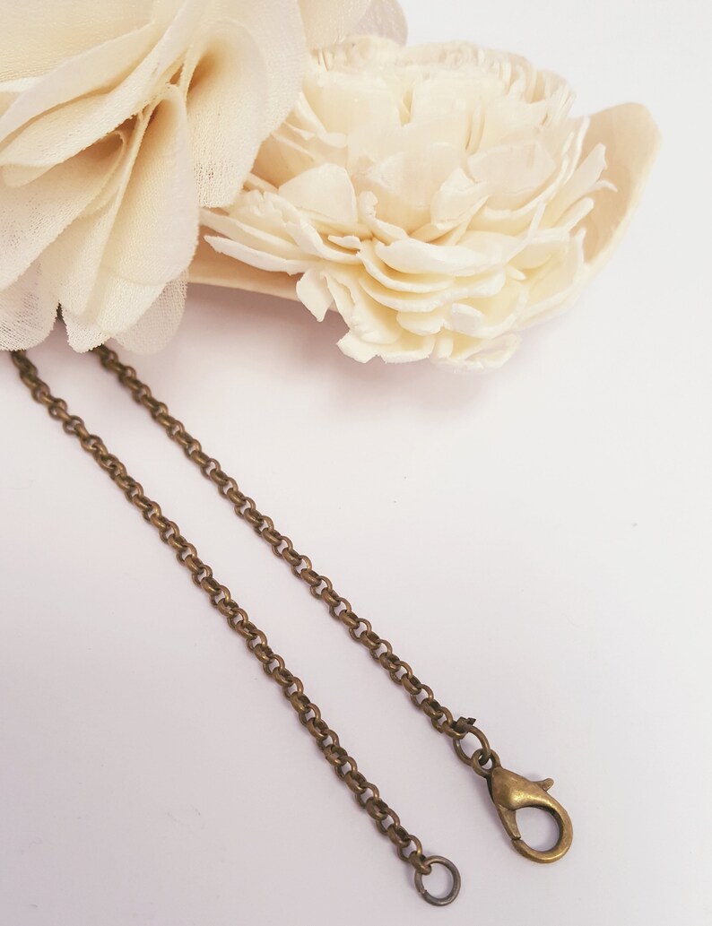 Handcrafted Birds Nest Necklace Large Birdsnest with natural soft blues of egg stones
