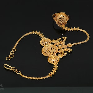 22kt yellow gold handmade filigree work hathpan or wrist bracelet with adjustable ring best wedding brides jewelry from india gbr25