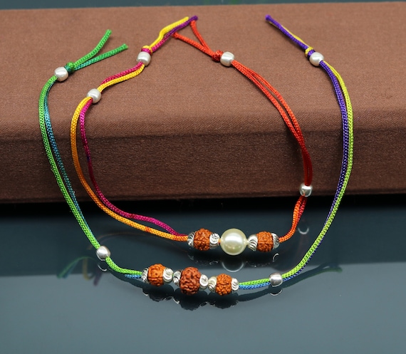 Stylish Bracelet-Style Rudraksh Rakhi | Send Rakhi Online to Your Brother