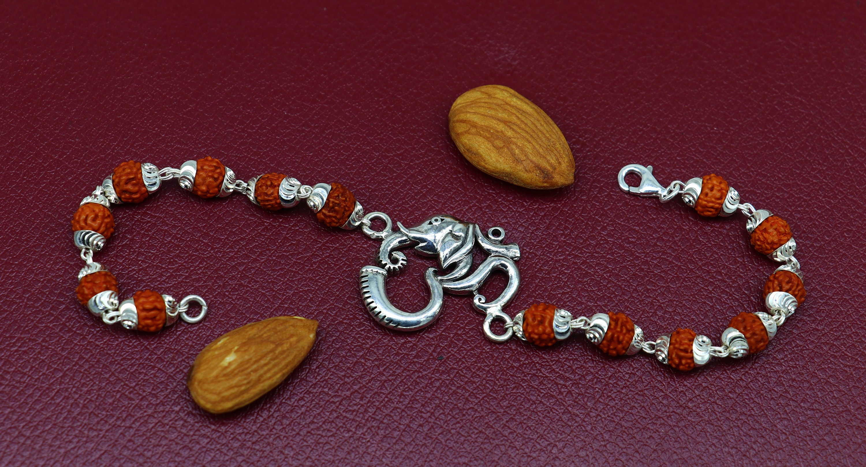 Silver Aum mala bracelet with Rudraksha mala beads and Silver.