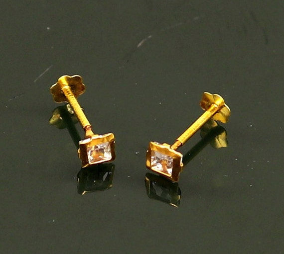 Gold earrings single stone deals